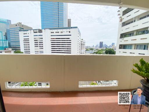 View from the balcony overlooking city buildings