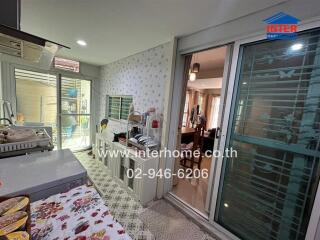 Modern kitchen with sliding doors and patterned flooring