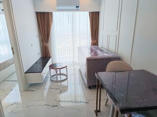 Modern living room with marble floor, air conditioner, and large window with curtains