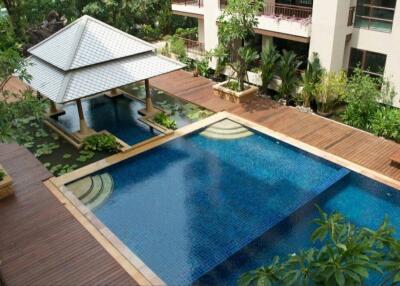 Swimming pool area with gazebo and landscaping