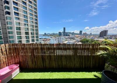 High-rise balcony with city and skyline view