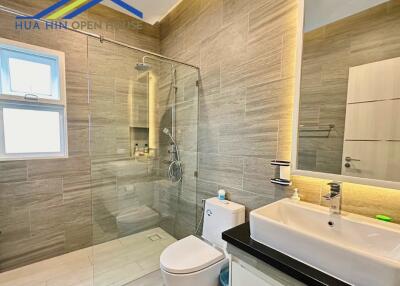 Modern bathroom with glass shower enclosure