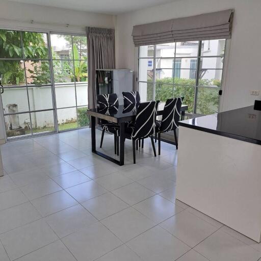 Spacious dining area with large windows