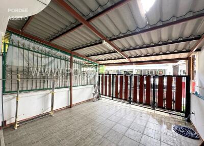 Carport with a corrugated metal roof