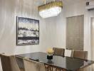 Modern dining room with elegant chandelier and glass table