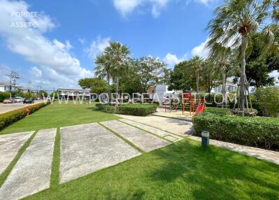 Outdoor area with playground and green space