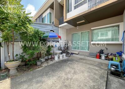 Exterior view of a modern house with front patio