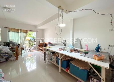 Spacious workspace with large table and natural lighting