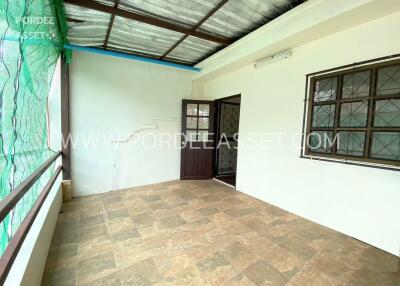 Spacious balcony with tiled flooring