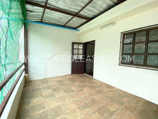 Spacious balcony with tiled flooring