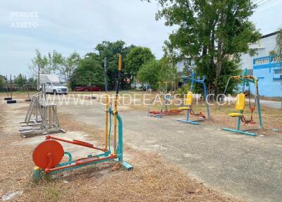 Outdoor gym area with exercise equipment