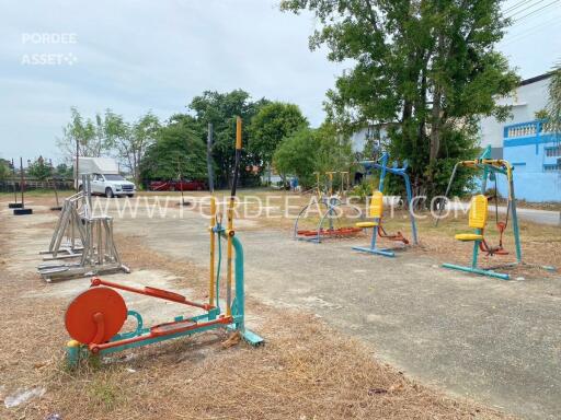 Outdoor gym area with exercise equipment