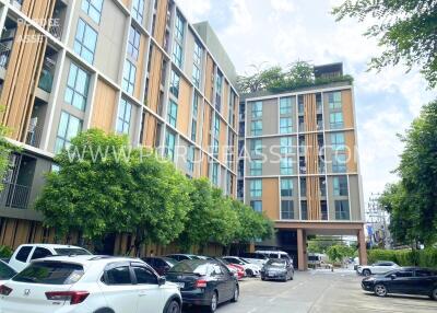 Front view of residential building with parking area