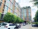 Front view of residential building with parking area