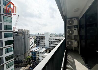 View of a balcony with cityscape in the background