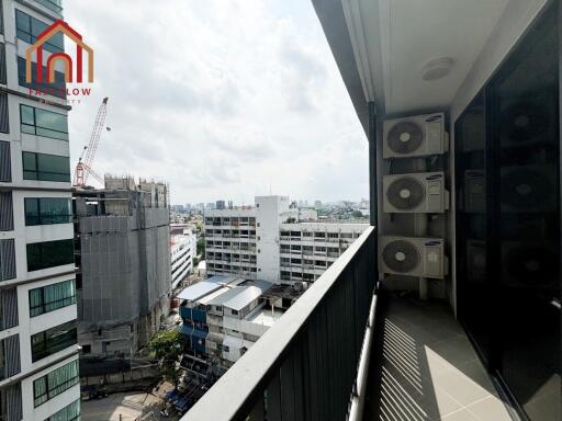 View of a balcony with cityscape in the background