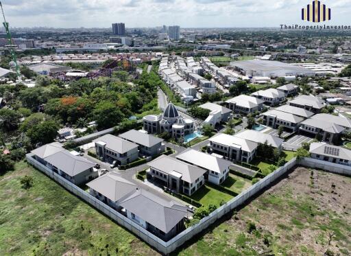 Aerial view of a residential neighborhood with multiple houses and buildings