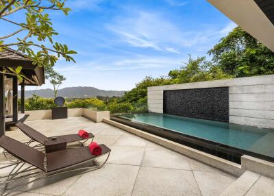 Luxurious outdoor pool area with mountain view