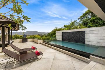 Luxurious outdoor pool area with mountain view