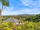 Scenic view overlooking a residential area with mountains in the background