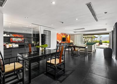 Modern open concept living and dining area with contemporary furnishings