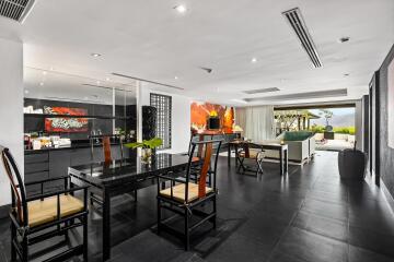 Modern open concept living and dining area with contemporary furnishings