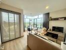 Bright and cozy living room with a scenic view from large windows