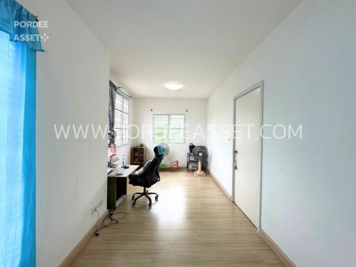 Spacious home office with natural lighting