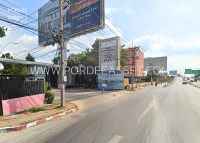 Street view with building and billboards