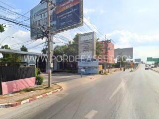 Street view with building and billboards