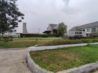 Club house exterior with lawn