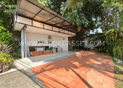 Outdoor patio with a covered area and ample open space