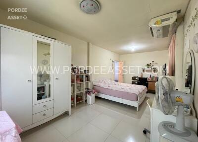 Bedroom with furniture and air conditioner