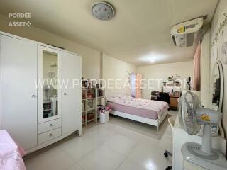 Bedroom with furniture and air conditioner