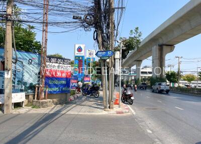 Street view with traffic and sidewalk