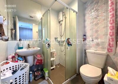 Modern bathroom with shower and amenities