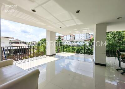 Spacious balcony with tiled floor and a view