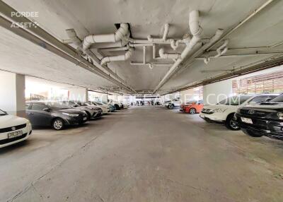 Indoor parking area with multiple cars