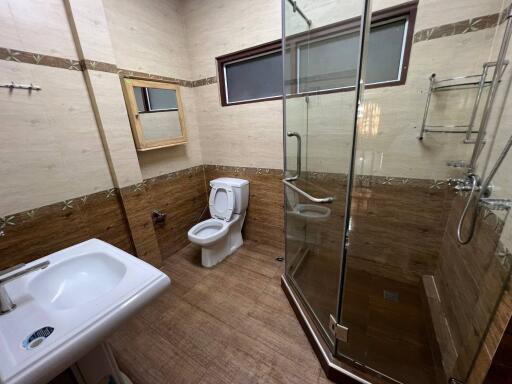 Bathroom with glass shower and toilet