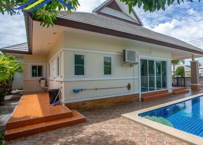 Exterior view of a house with swimming pool