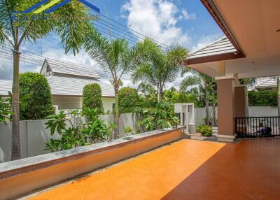 Outdoor patio with palm trees