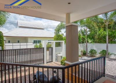 Covered outdoor area with garden view