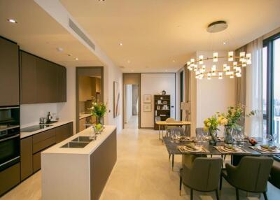 Modern kitchen and dining area in an upscale apartment with stylish fixtures