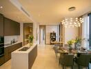 Modern kitchen and dining area in an upscale apartment with stylish fixtures