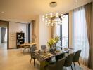 Modern dining room with chandelier and large windows