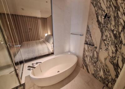 Bathroom with bathtub and shower