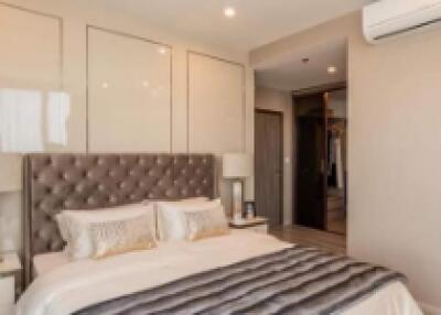 Modern and luxurious bedroom with king-size bed and air conditioning