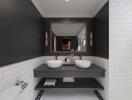 Modern bathroom with dual sinks and a large mirror