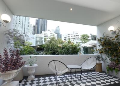 Outdoor balcony with a view of the city