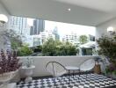 Outdoor balcony with a view of the city